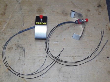 Credit button assembly