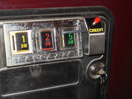 Credit button, fitted